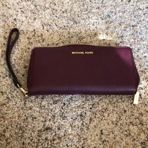 Never been used Michael Kors  wristlet.